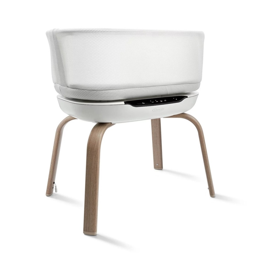 Sleek White Baby Bassinet with Wooden Legs